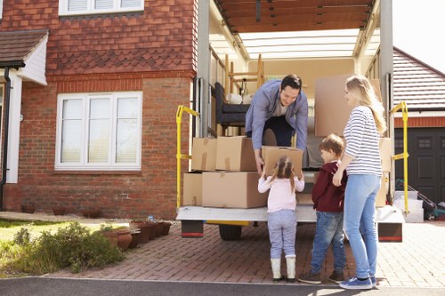 Loading furniture into a moving truck for an Earlsfield move
