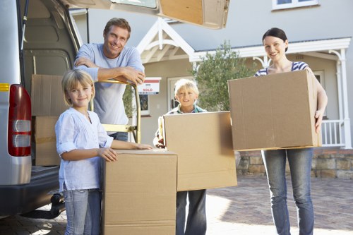 Packed boxes and furniture ready for a home removal service in Earlsfield