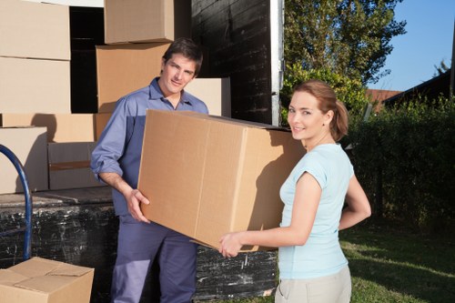 Close-up of furniture being handled carefully during transport
